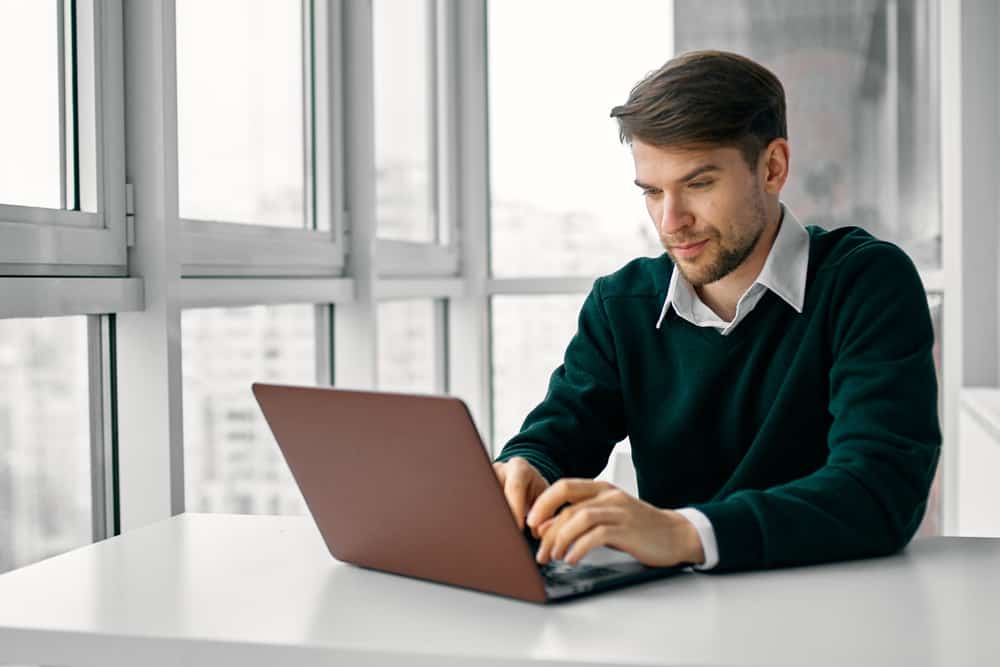 62acd98817bc4_man-using-laptop